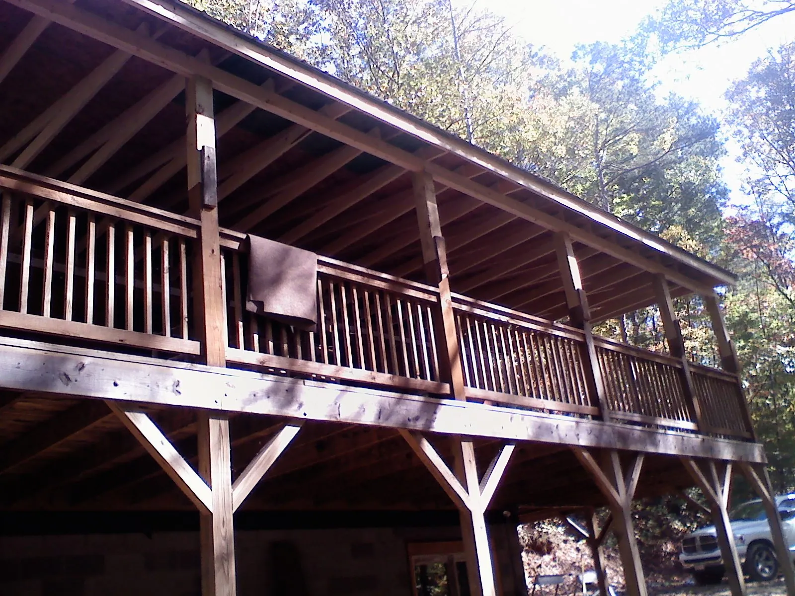 Timber framing under a new elevated porch and deck — Roof Leak Repair in Veneta by Roofing Brothers